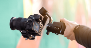 holding professional camera for video shooting